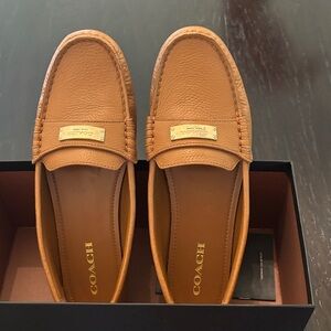 Coach Women’s  Cognac Leather Penny Loafers with Gold Plaque